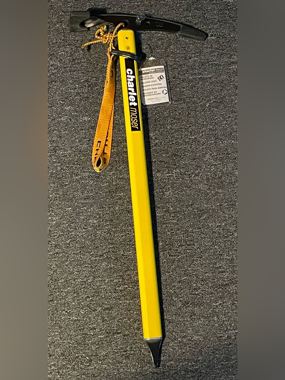 New with Tag  Charlet Moser Ice Axe with original wrist leash and point guard.